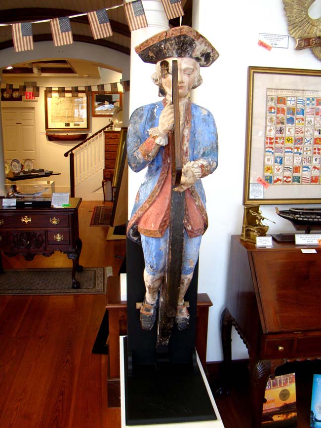 An exceptionally rare 18th century Ship Chandler's Trade Sign in the form of a French Naval Captain looking through his octant circa 1750. — image 6